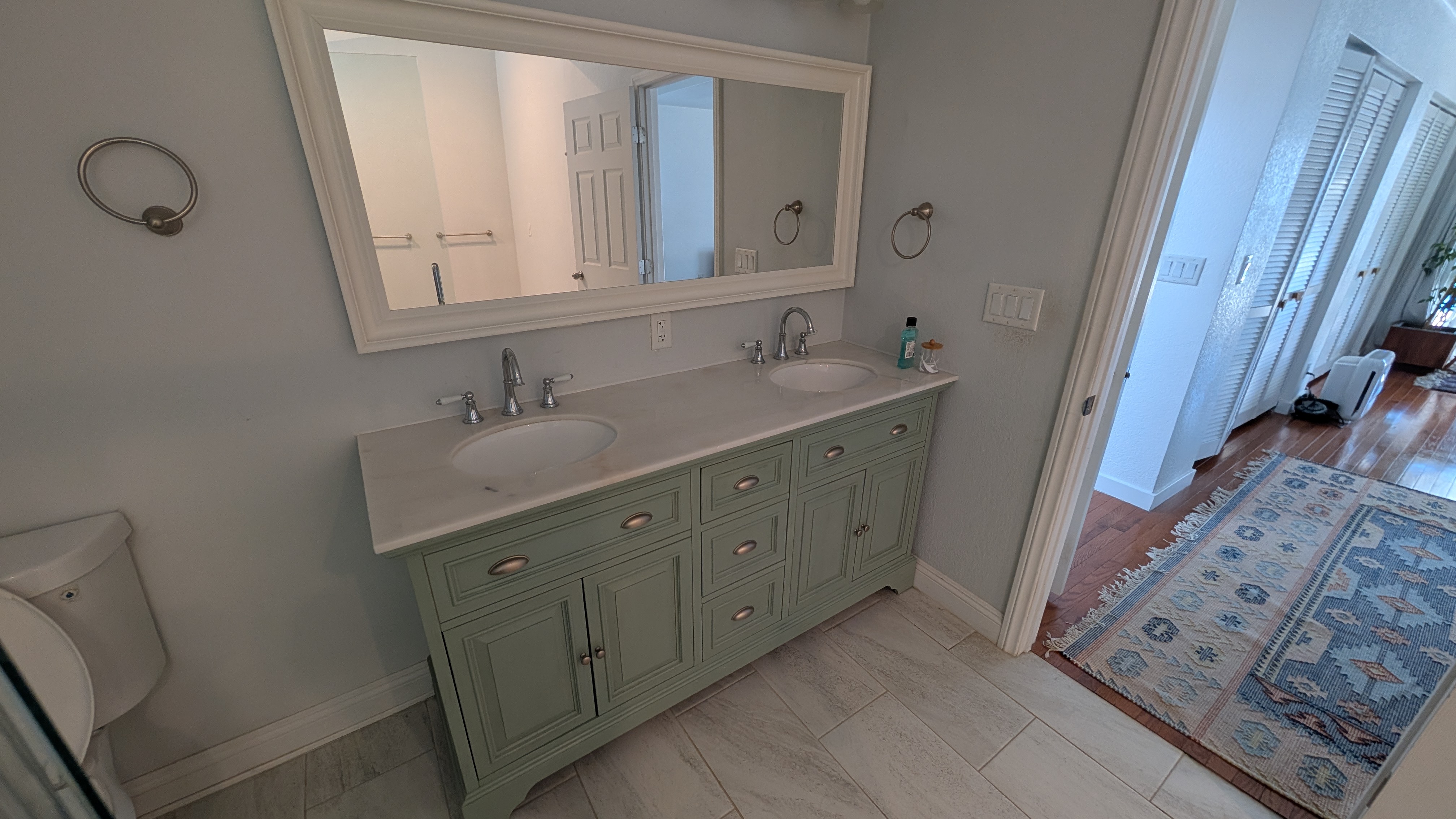 Close up of the vanity - you can see the rich style of decor in the primary bedroom area